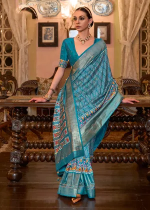 Lovely Firozi Blue Woven Zari & Printed Patola Silk Traditional Saree