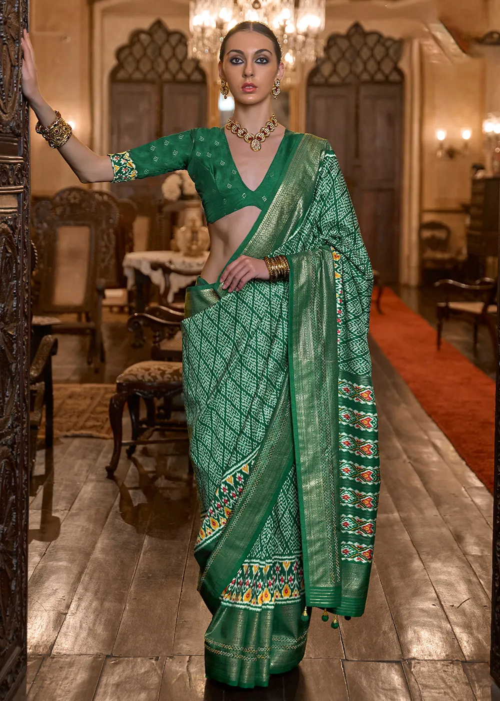 Marvelous Green Woven Zari & Printed Patola Silk Traditional Saree