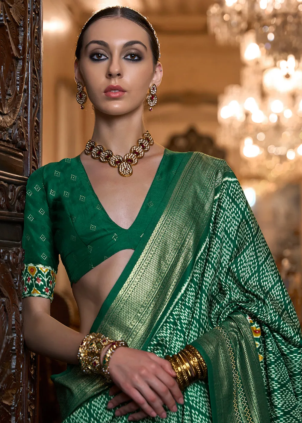 Marvelous Green Woven Zari & Printed Patola Silk Traditional Saree